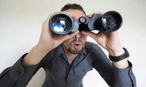 man-looking-through-binoculars-600x360-300x180